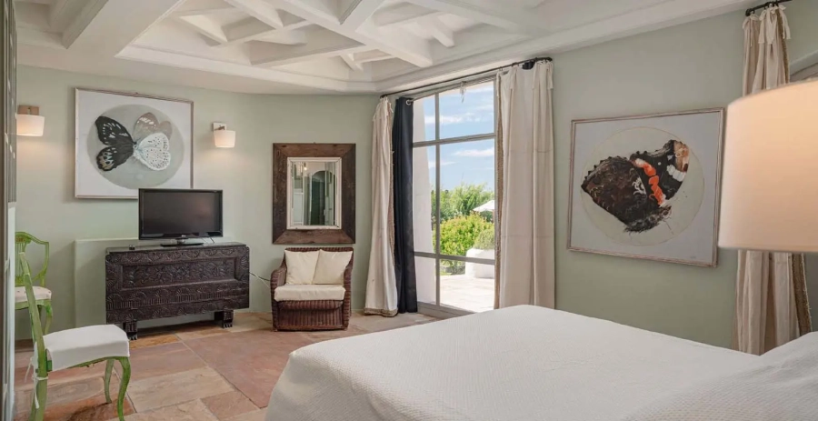 Light-filled double bedroom with coastal styling
