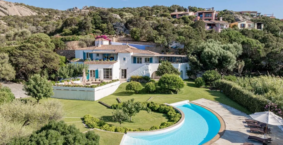 Poolside terrace and Mediterranean gardens facing the Sardinian coast